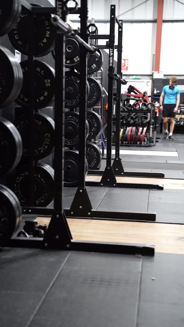 A row of squat racks at TT Fitness Hub